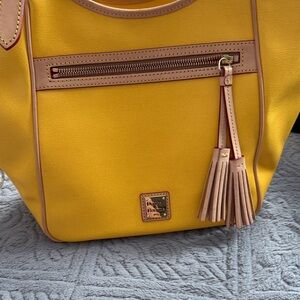 Dooney & Bourke Yellow Tote with Tan Trim and Tassel